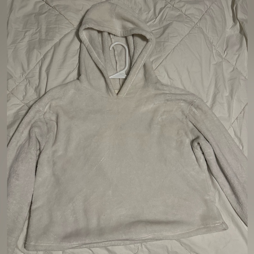 A white, soft cropped at waist sweater. Made by So, size M (Medium) in juniors